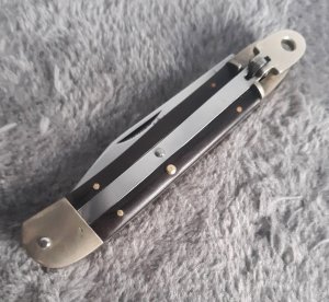 Vintage 1980's Hubertus Maroon Micarta clip point 7 1/4"