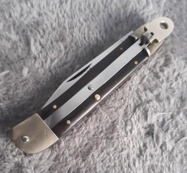 Vintage 1980's Hubertus Maroon Micarta clip point 7 1/4" Vintage 1980's Hubertus Maroon Micarta clip point 7 1/4"