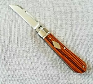 Riaan Ras Desert Ironwood Swayback Native.N690..high polish finish..4" clsd..long pull..coa