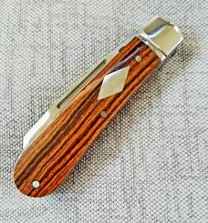 Riaan Ras Desert Ironwood Swayback Native.N690..high polish finish..4" clsd..long pull..coa Riaan Ras Desert Ironwood Swayback Native.N690..high polish finish..4" clsd..long pull..coa