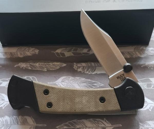 Buck 112 Ranger Sport. Green Canvas Micarta with Black Anodized Aluminum Frame. S30V steel. BNIB
