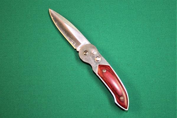 Switchblade with Cherry Handle / Locking / Stainless Steel Blade / Belt Clip Switchblade with Cherry Handle / Locking / Stainless Steel Blade / Belt Clip