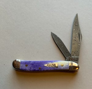 CASE Peanut Damascus Blades Ultra Violet with Etched Bolsters