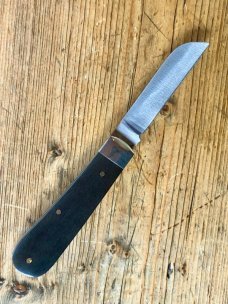 A Wright & Son Sheffield, England "Tackler" Pocket Knife in Ebony Scales and Wharncliffe Blade