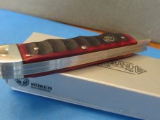 Boker Tree Brand Red Bone Finger Grooved Trapper Pattern # BK112525FGR Boker Tree Brand Red Bone Finger Grooved Trapper Pattern # BK112525FGR