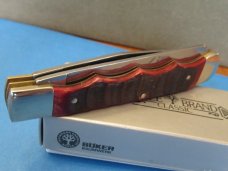 Boker Tree Brand Red Bone Finger Grooved Trapper Pattern # BK112525FGR Boker Tree Brand Red Bone Finger Grooved Trapper Pattern # BK112525FGR