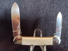 KEEN KUTTER IVORY CANOE, NEW WITH METAL TIN BOX KEEN KUTTER IVORY CANOE, NEW WITH METAL TIN BOX