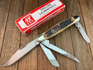 Henckels by Boker 4 Blade Stockman Fossilized Ivory Pin Feather Jigged 