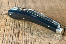 A Wright & Son "Ettrick" Carving Knife with Buffalo Horn Scales and Curved Wharncliffe Blade A Wright & Son "Ettrick" Carving Knife with Buffalo Horn Scales and Curved Wharncliffe Blade