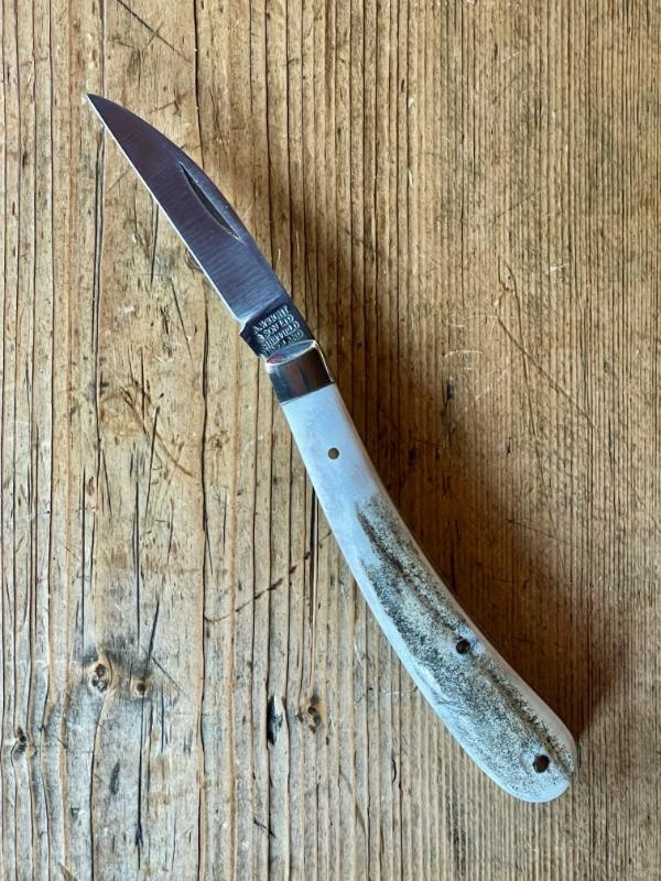 A Wright & Son "Ettrick" Carving knife with Stag Scales and Curved Wharncliffe Blade