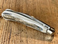 A Wright & Son "Ettrick" Carving Knife with Stag Scales and Curved Wharncliffe Blade & Filed Spring