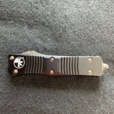 Microtech Troodon T/E Bronze full serrated