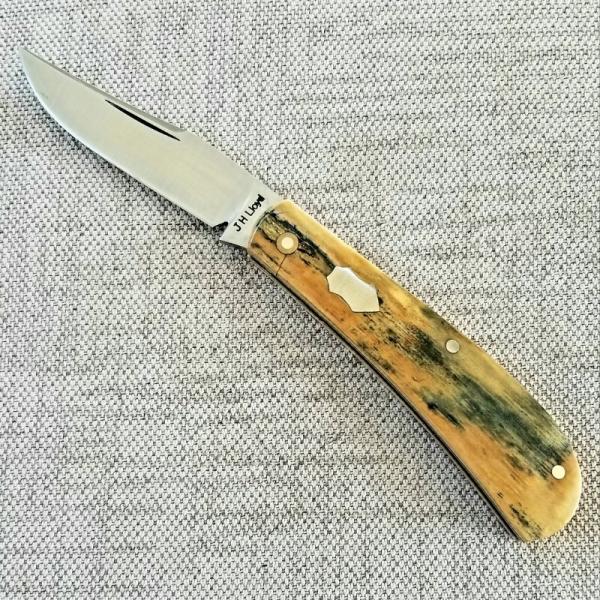 John Lloyd Mammoth Ivory Trapper..52100..3.75" closed..stabilized crack from Lloyd at pivot John Lloyd Mammoth Ivory Trapper..52100..3.75" closed..stabilized crack from Lloyd at pivot
