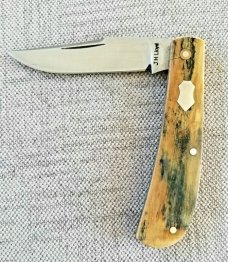 John Lloyd Mammoth Ivory Trapper..52100..3.75" closed..stabilized crack from Lloyd at pivot John Lloyd Mammoth Ivory Trapper..52100..3.75" closed..stabilized crack from Lloyd at pivot