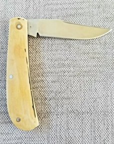 John Lloyd Mammoth Ivory Trapper..52100..3.75" closed..stabilized crack from Lloyd at pivot John Lloyd Mammoth Ivory Trapper..52100..3.75" closed..stabilized crack from Lloyd at pivot