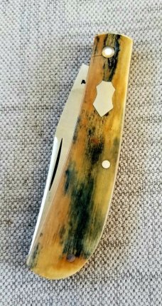 John Lloyd Mammoth Ivory Trapper..52100..3.75" closed..stabilized crack from Lloyd at pivot John Lloyd Mammoth Ivory Trapper..52100..3.75" closed..stabilized crack from Lloyd at pivot