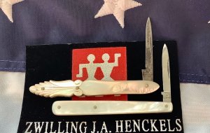 Antique J A Henckels, 2 Single Blade Mother of Pearl Quil? Knives. Hand carved flashy pearl
