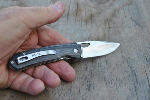 Buck Model 257 1 Blade Mint 4" Closed One Hand Open Liner Lock Pocket Clip Green/Black Wood Handles Buck Model 257 1 Blade Mint 4" Closed One Hand Open Liner Lock Pocket Clip Green/Black Wood Handles