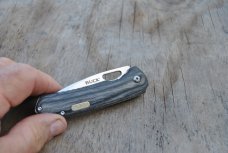 Buck Model 257 1 Blade Mint 4" Closed One Hand Open Liner Lock Pocket Clip Green/Black Wood Handles