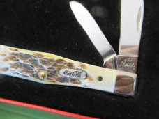 Case XX Burnt Antique Amber Bone Coke Bottle Pattern # 6225 1/2 SS Case XX Burnt Antique Amber Bone Coke Bottle Pattern # 6225 1/2 SS