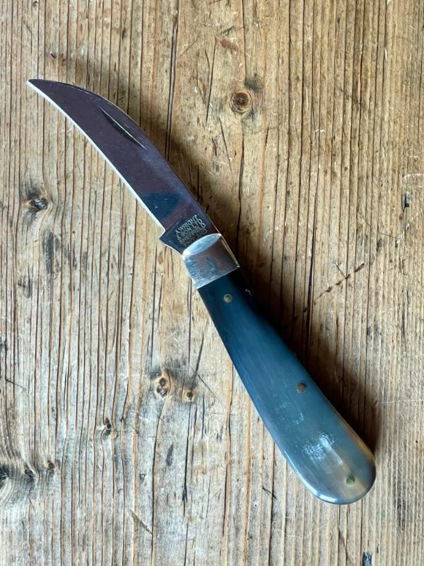 A Wright & Son "Peach" Swayback Knife with Buffalo Scales and Curved Wharncliffe Blade