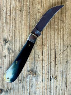 A Wright & Son "Peach" Swayback Knife with Buffalo Scales and Curved Wharncliffe Blade