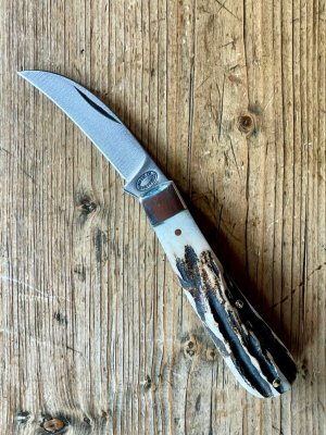 A Wright & Son Peach Pruning Knife with Stag Scales and Curved Wharncliffe Blade