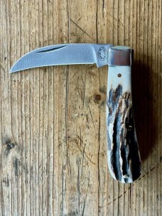 A Wright & Son Peach Pruning Knife with Stag Scales and Curved Wharncliffe Blade