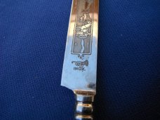 Beautiful Artistic Small Gaucho Knife with decorated metal scabbard. Made in Argentina Beautiful Artistic Small Gaucho Knife with decorated metal scabbard. Made in Argentina