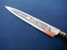 Beautiful Artistic Small Gaucho Knife with decorated metal scabbard. Made in Argentina Beautiful Artistic Small Gaucho Knife with decorated metal scabbard. Made in Argentina