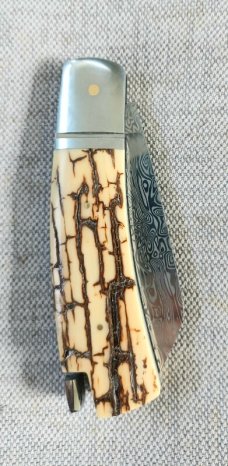 Steve Vanderkolff White Crackle Mammoth Native Taillock..4"cld Damasteel...fluted integral blsters Steve Vanderkolff White Crackle Mammoth Native Taillock..4"cld Damasteel...fluted integral blsters