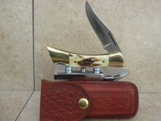 Case XX Stag Shark Tooth Lockback with Sheath (1979) Case XX Stag Shark Tooth Lockback with Sheath (1979)