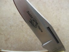 Case XX Stag Shark Tooth Lockback with Sheath (1979) Case XX Stag Shark Tooth Lockback with Sheath (1979)