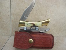 Case XX Stag Shark Tooth Lockback with Sheath (1979) Case XX Stag Shark Tooth Lockback with Sheath (1979)