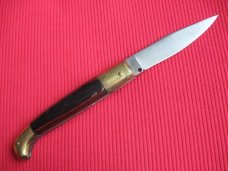 Vintage Italian Indiana Engraved Bolster Button Open/Close Switchblade Knife. Vintage Italian Indiana Engraved Bolster Button Open/Close Switchblade Knife.