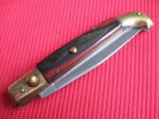 Vintage Italian Indiana Engraved Bolster Button Open/Close Switchblade Knife. Vintage Italian Indiana Engraved Bolster Button Open/Close Switchblade Knife.