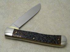Western USA S-693 D Racoon Etch Jigged Delrin Linerlock 1 Blade Trapper Knife
