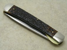 Western USA S-693 D Racoon Etch Jigged Delrin Linerlock 1 Blade Trapper Knife