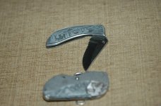 Unlike Most Decorative Belt Buckle Knife Unlike Most Decorative Belt Buckle Knife