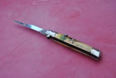 Switchblade Italian Riccordo di Assisi 3 3/4" Closed Button Lock/Open St. Francis On Reverse Switchblade Italian Riccordo di Assisi 3 3/4" Closed Button Lock/Open St. Francis On Reverse