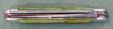 Customized Schrade 97OT Buzzsaw Trapper
