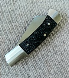 Riaan Ras Sheepsfoot Slipjoint..Jigged Buffalo Horn..14c28n .high polish blade..Castle.. 3.5"..coa Riaan Ras Sheepsfoot Slipjoint..Jigged Buffalo Horn..14c28n .high polish blade..Castle.. 3.5"..coa