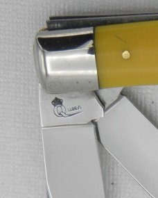 Queen Cutlery #19A Trapper: 4 1/8” closed, circa 1974, etched blade, amber handles Queen Cutlery #19A Trapper: 4 1/8” closed, circa 1974, etched blade, amber handles