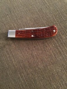 2000 TONY BOSE 62000 ATS-34 CHESTNUT MILLENNIUM JIGGED TRAPPER WITH BADGE SHEILD & TWO BLADES 2000 TONY BOSE 62000 ATS-34 CHESTNUT MILLENNIUM JIGGED TRAPPER WITH BADGE SHEILD & TWO BLADES