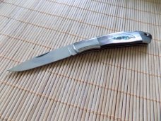 Never Used MOKI Black Pearl knife with leaf inlaid shield