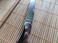 Never Used MOKI Black Pearl knife with leaf inlaid shield