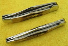 KA-BAR Union Cut Co. Dogs Head, Swell Center Folding Hunter. 2 Knife Set in the box. ...........(R5) KA-BAR Union Cut Co. Dogs Head, Swell Center Folding Hunter. 2 Knife Set in the box. ...........(R5)