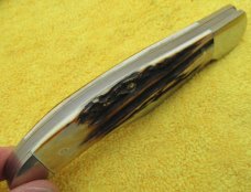 KA-BAR Union Cut Co. Dogs Head, Swell Center Folding Hunter. 2 Knife Set in the box. ...........(R5) KA-BAR Union Cut Co. Dogs Head, Swell Center Folding Hunter. 2 Knife Set in the box. ...........(R5)