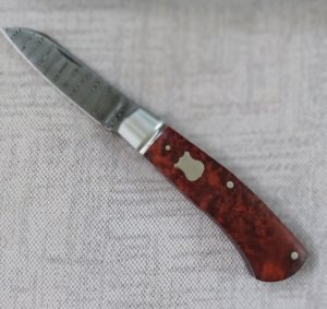 Pablo Castellani Amboyna Damascus Native..4" closed...Fluted/integral/doved bolsters..makers pouch 