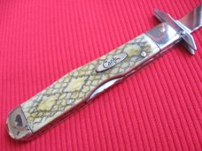 Case CHEETAH Limited XX Edition Custom Double Action Rattlesnake Bone Swing Guard Switchblade Knife Case CHEETAH Limited XX Edition Custom Double Action Rattlesnake Bone Swing Guard Switchblade Knife